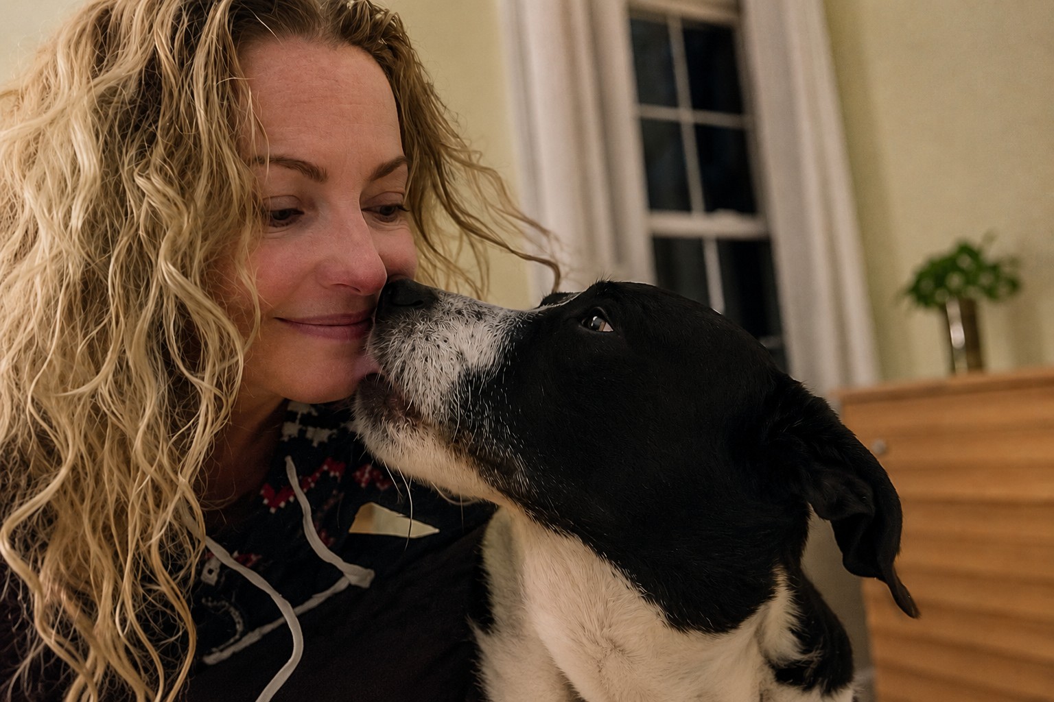 A quiet moment of unconditional love between a woman and her rescue dog, symbolizing the healing, peace, and forgiveness that come from choosing love over resentment.